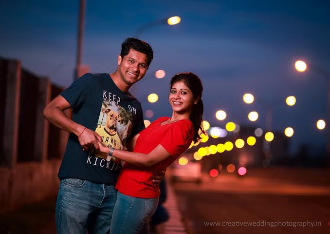 Couples glowing in street light
