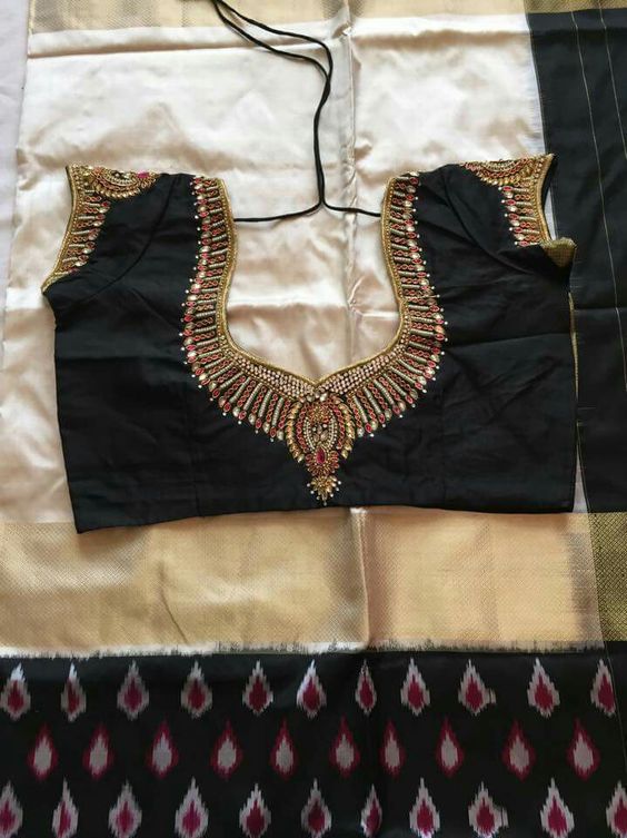 35. Black blouse with silver jardosi and stone maggam work blouse