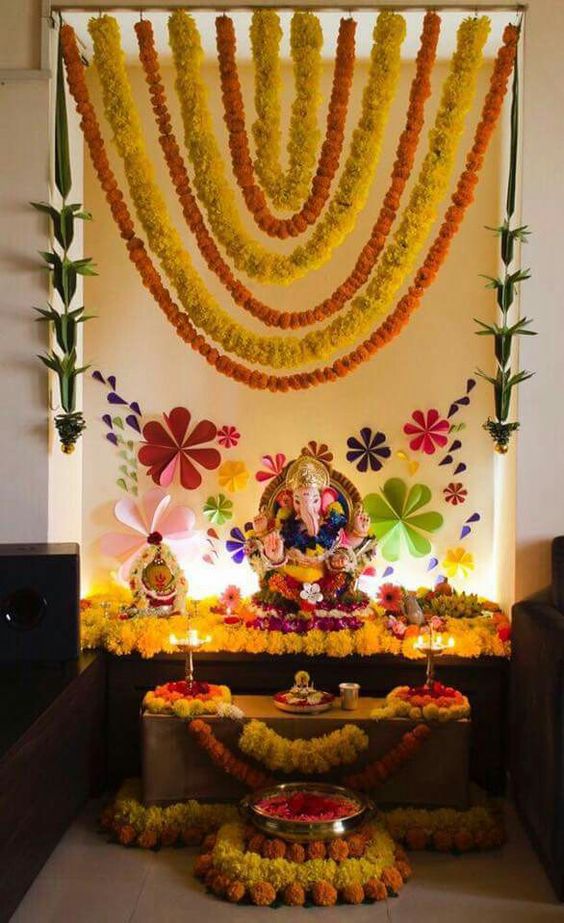 Ganesha decorated with floweral garland 