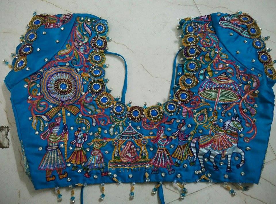 52. Blue blouse with varali work maggam design