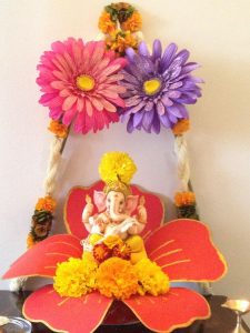 Ganesha placed above big flower