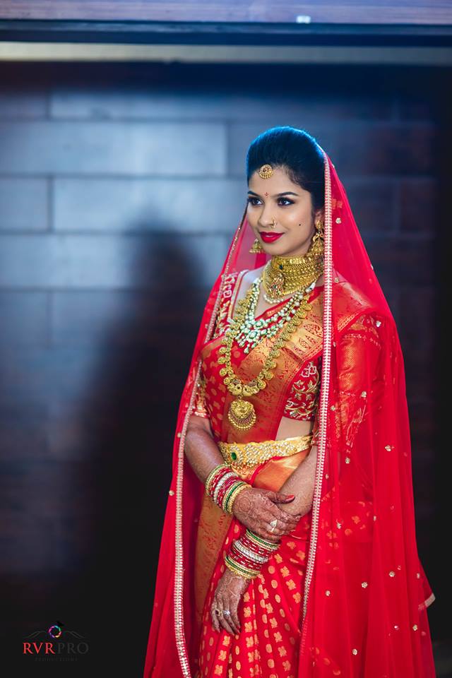 30. Red silk saree with golden Buttas 