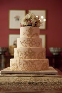 Modern gold and striped wedding cake
