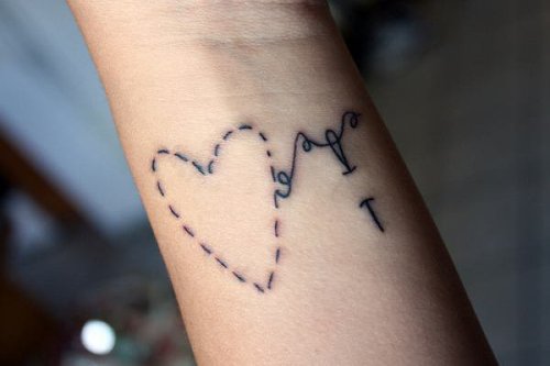 6.Love stitched tattoo 