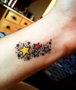 20.Colorful stars tattoo