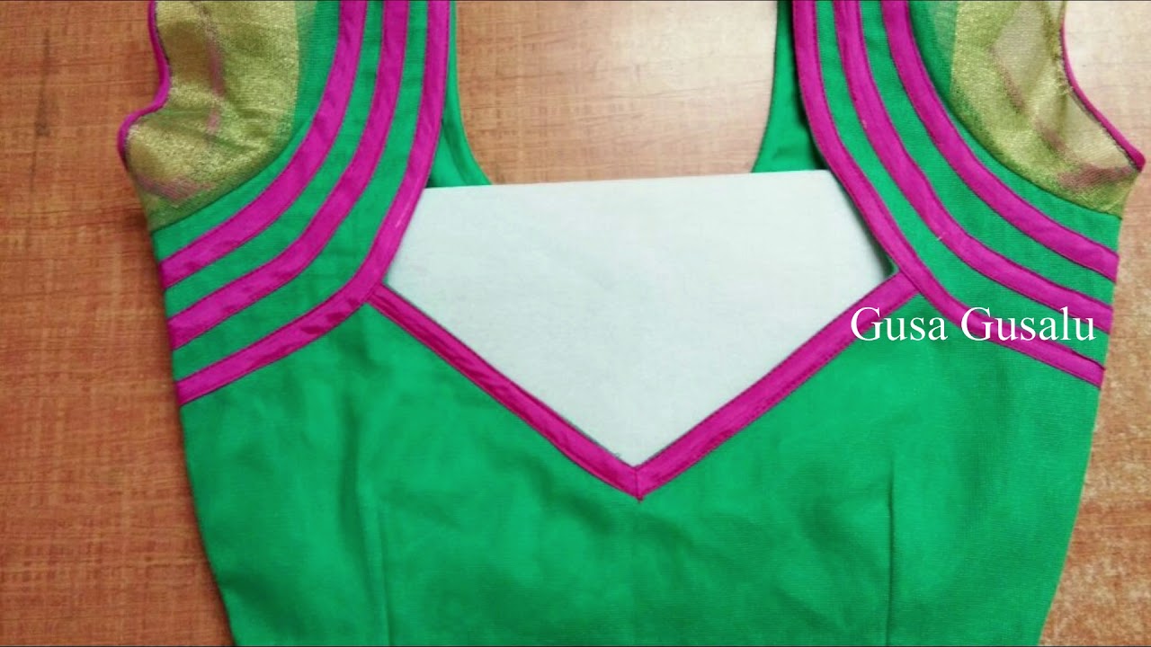 11.Green blouse with purple work