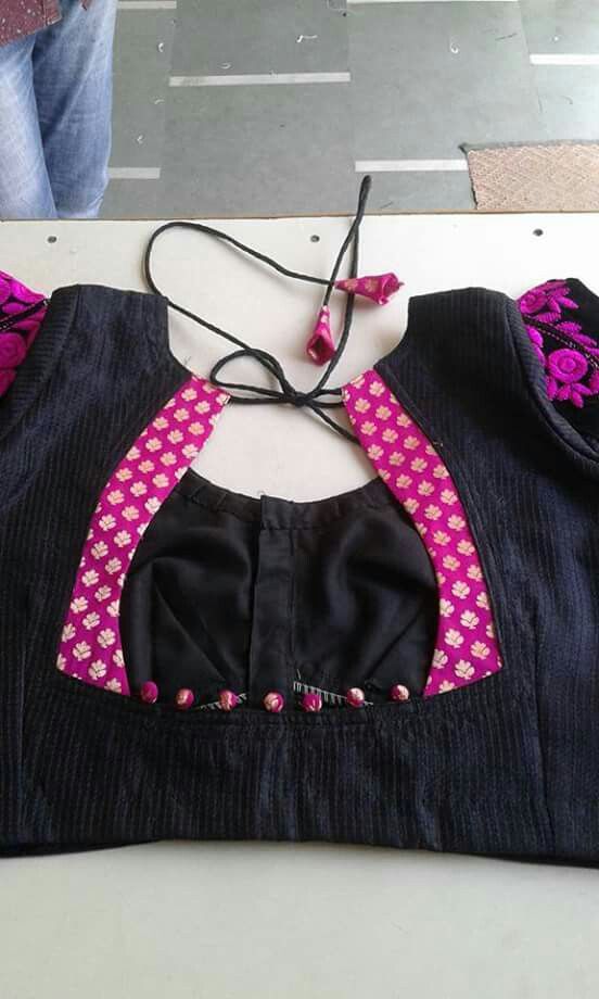 20.Black with floweral pink blouse