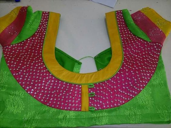 33.Green blouse with yellow and pink work