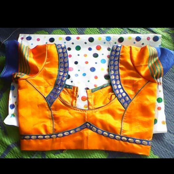 54.Yellow blouse with Blue dots cloth work