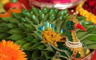 24.Peacock decoration with betel leaves 