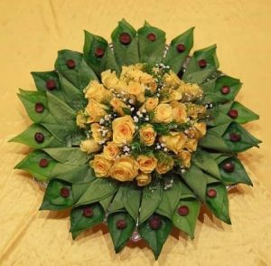 26.Betel leaf plate decoration with yellow rose