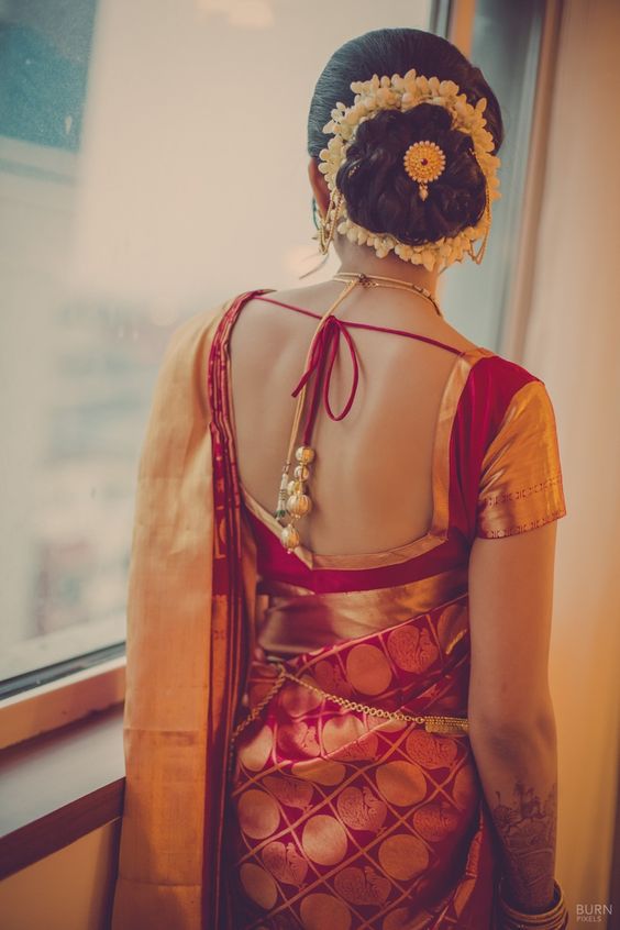 Reception Bun Hairstyle for Red Saree | Photo Gallery 