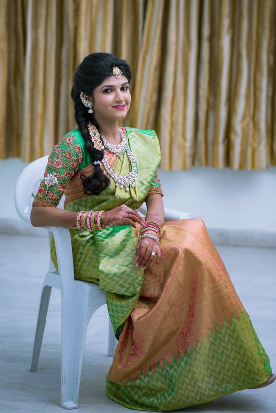 Braid Hairstyle for a Green Saree bride | Photo Gallery 