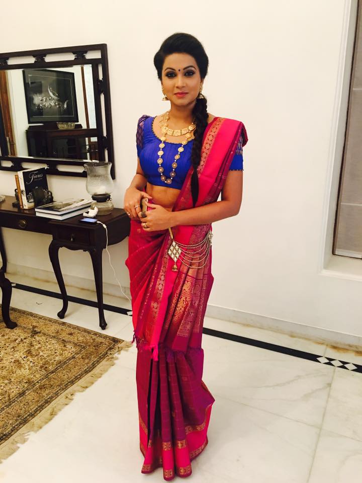 Red reception saree with Braid Hairstyle | Photo Gallery 
