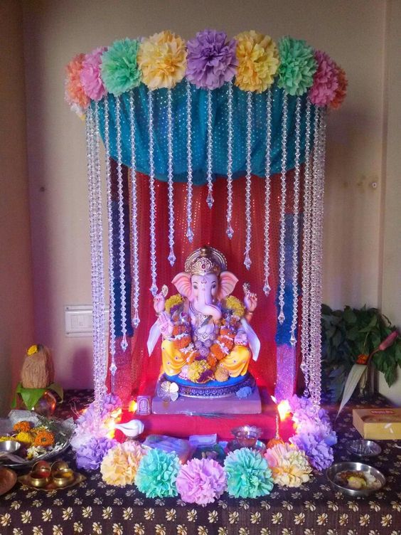 Ganesha placed inside beautiful colorful madapam