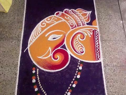 Orange with Red Ganesa Face rangoli