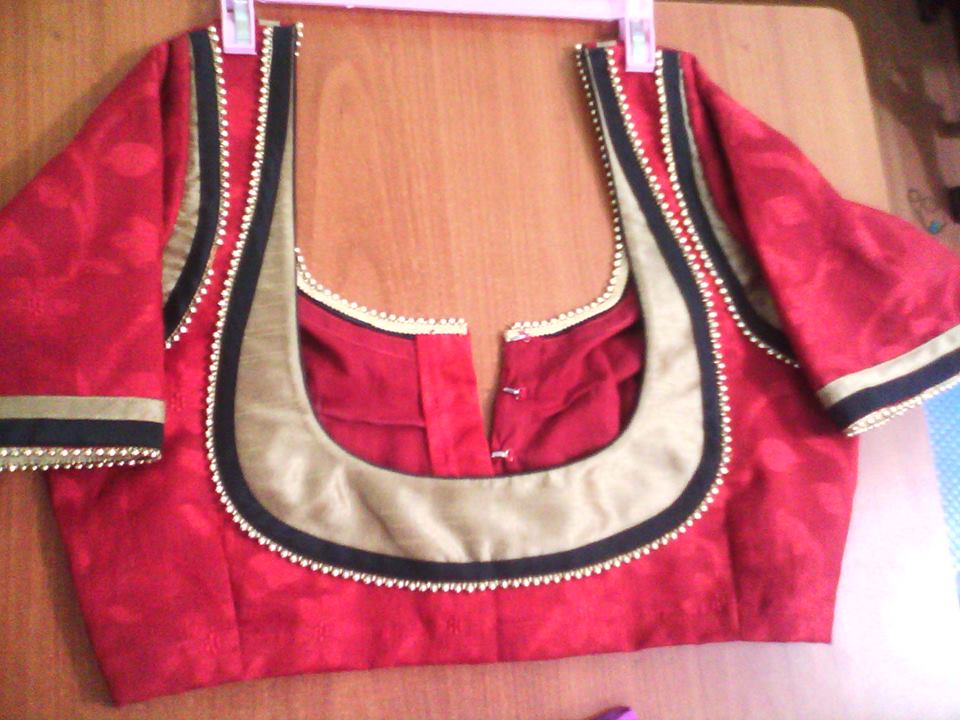 24. Red blouse with Golden patch work