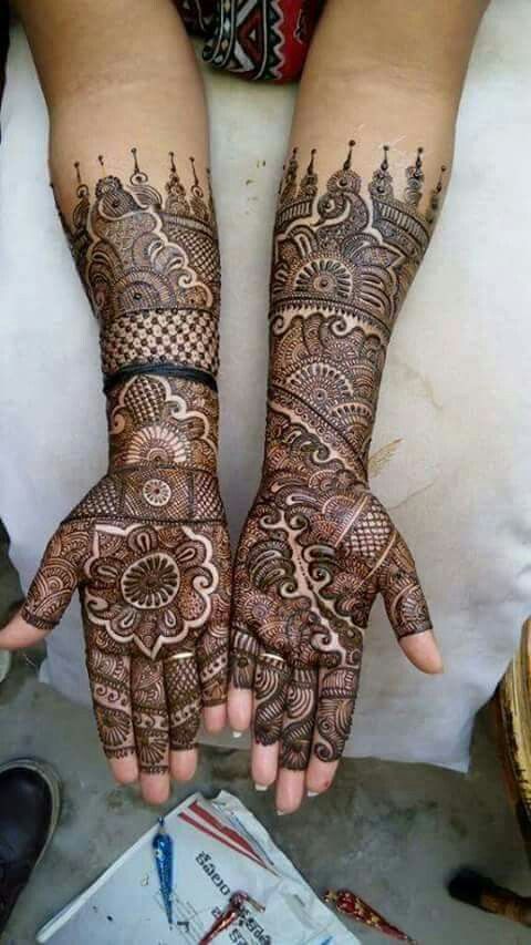 26. Traditional Bridal Full Hand mehndi