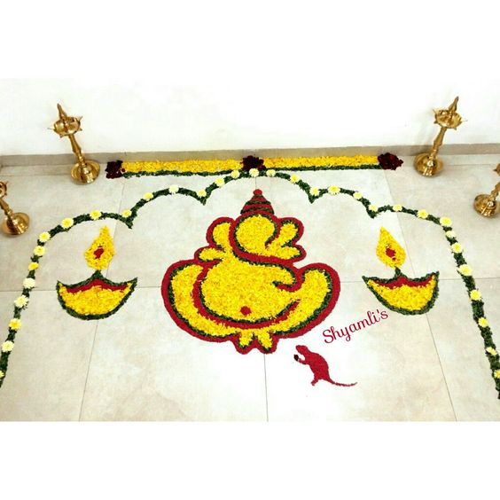 Ganesh rangoli with SunFlower