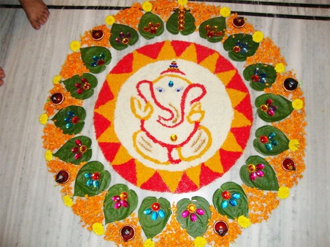 Ganesh rangoli with betal leaves