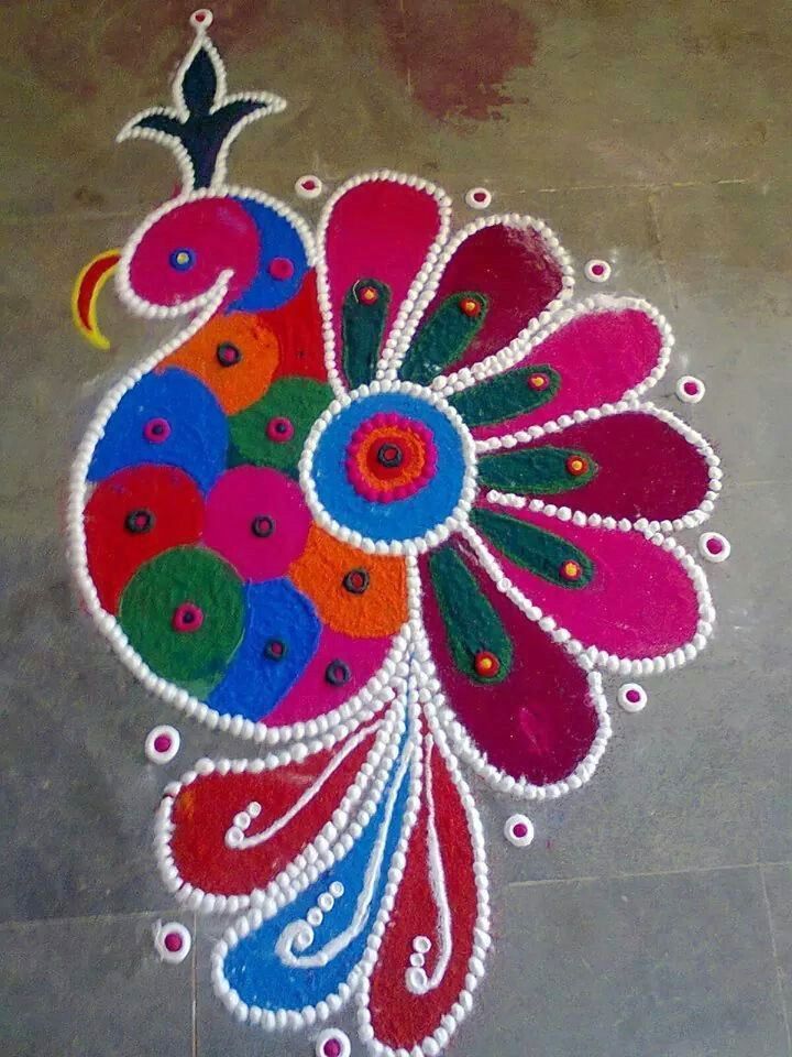 Peacock rangoli using old cd's