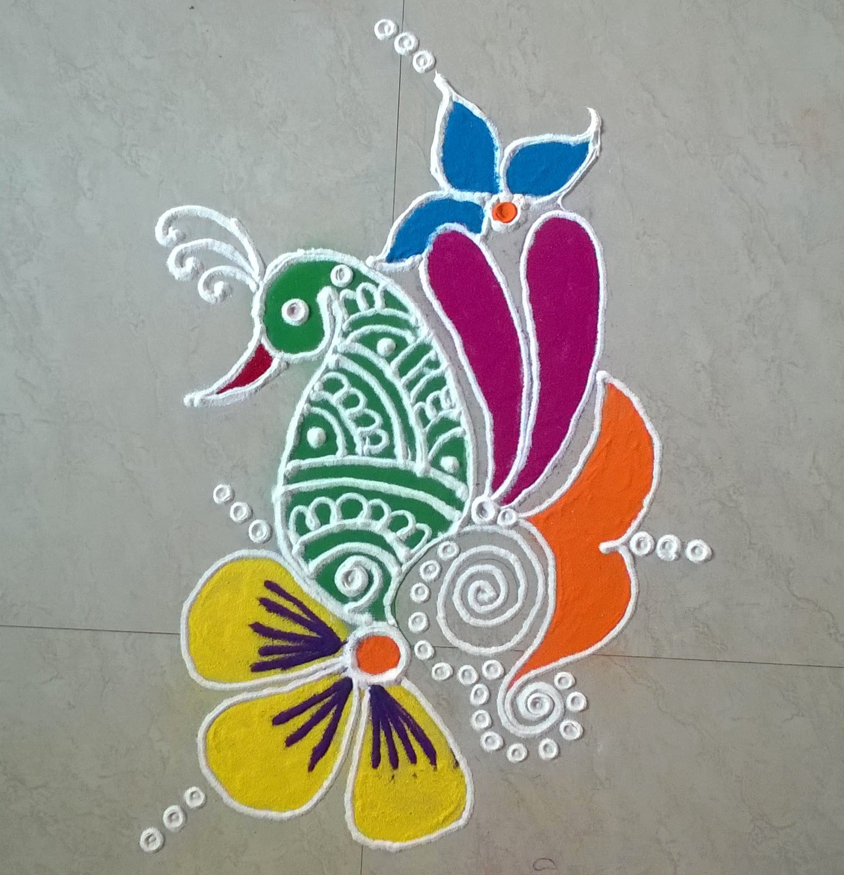 Peacock rangoli using old cd's