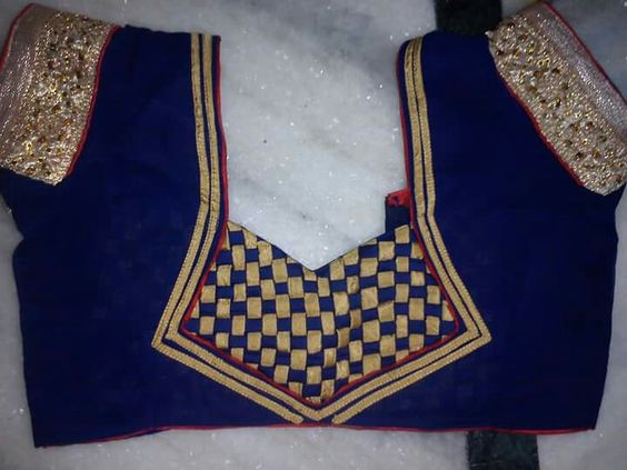 45. Royal Blue blouse with golden checker patch work