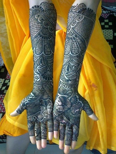 5. Peacock and drums bridal mehndi