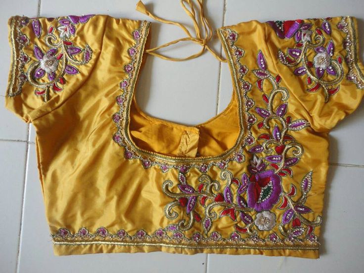 53. Intricate blouse border maggam work with golden zari