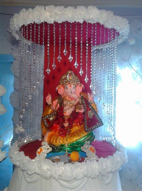 7. Dancing Ganesha Decoration in beautiful white theme madapam