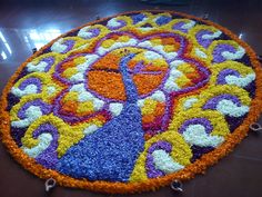 12. Peacock Pookolam