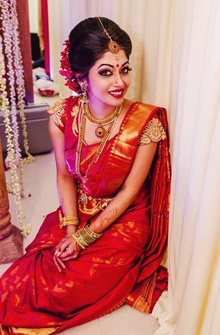 13. Red Self design silk saree