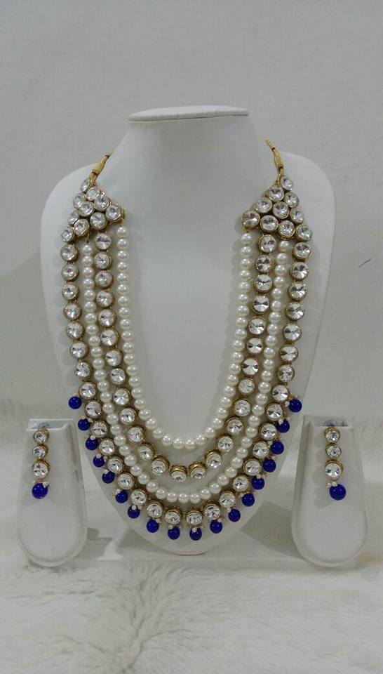 14.White pearl with kundan and blue neck set