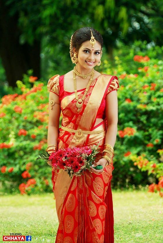 2. Red Silk Saree with Golden Round Design