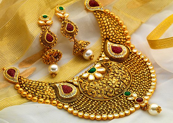 20.Kundan stone with Mango Design