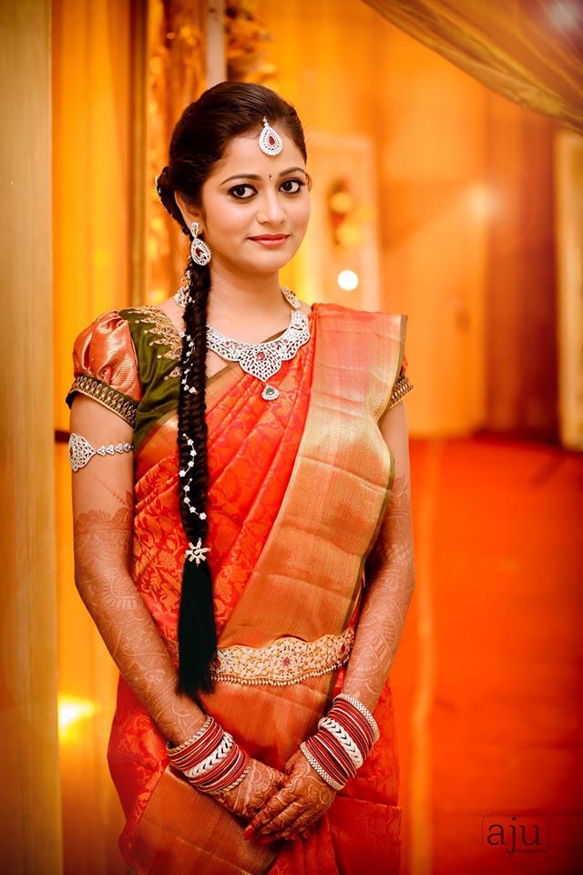 27.Red silk saree with red and green blouse