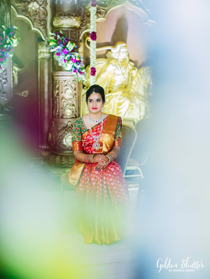 31.Red silk saree with silver and gold zari