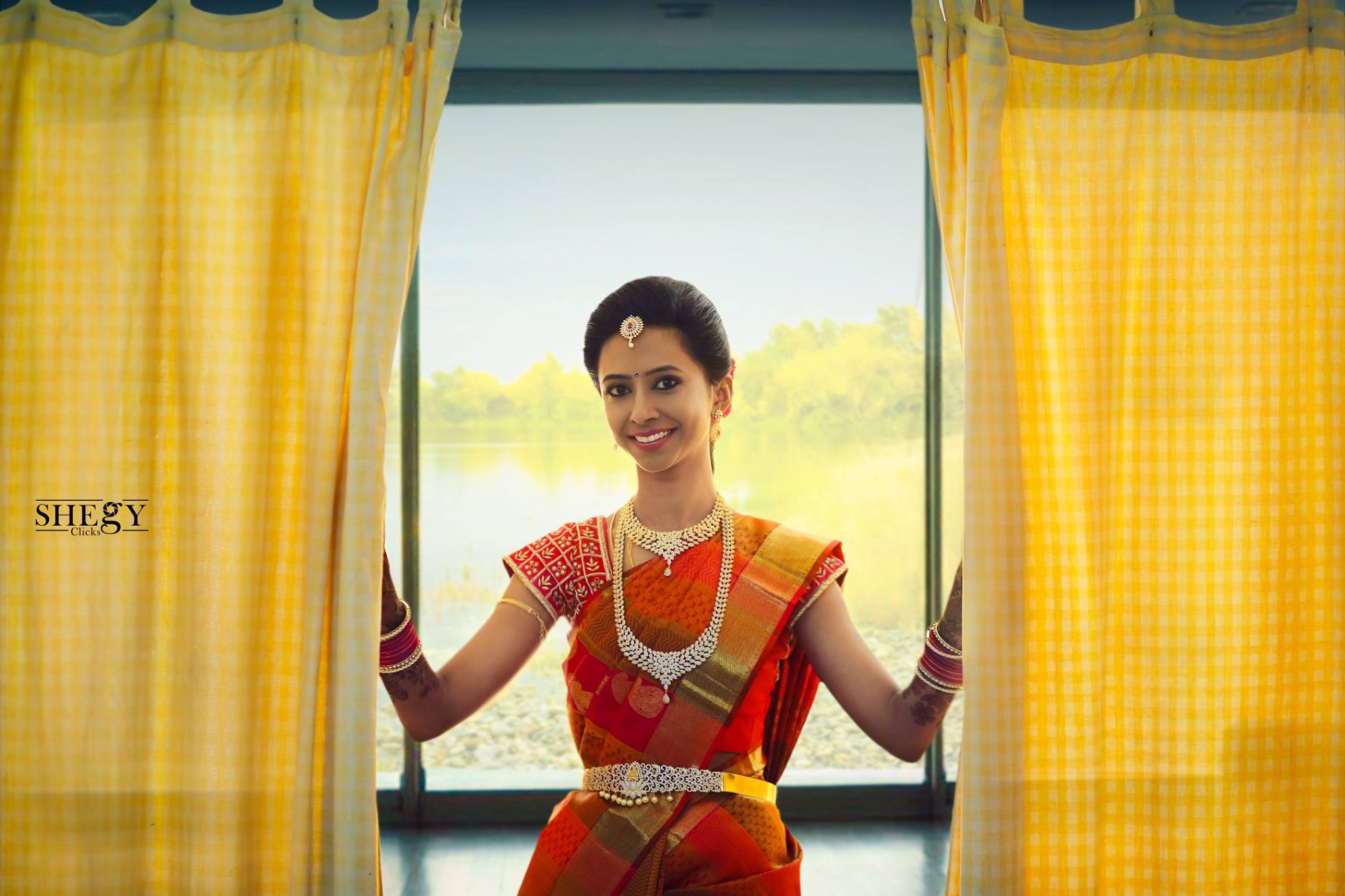 43.Red silk saree with mango and line design