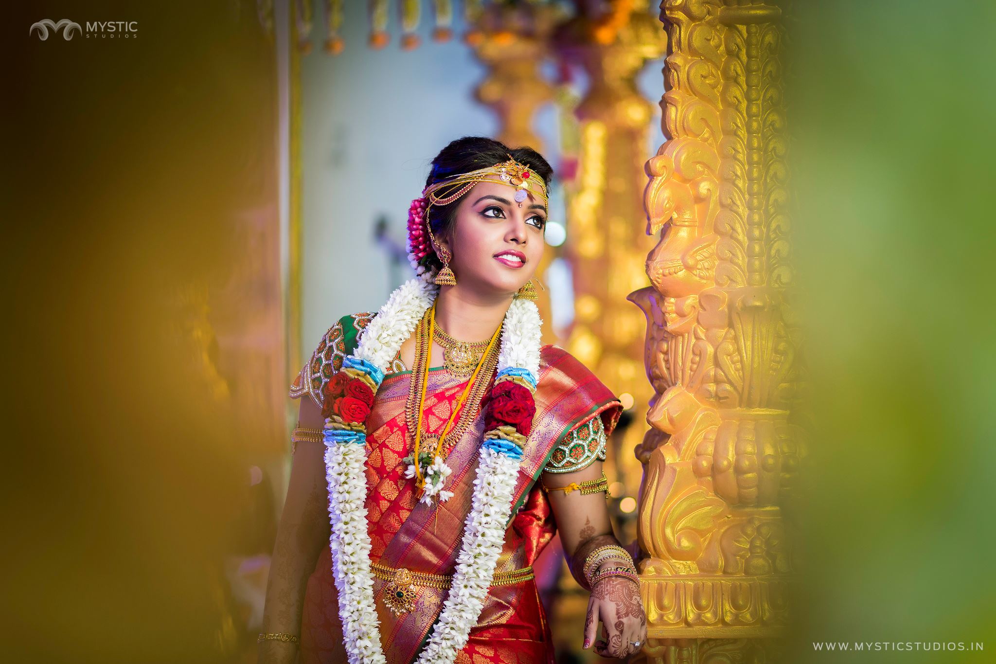 47. Small Green border in Red Silk saree