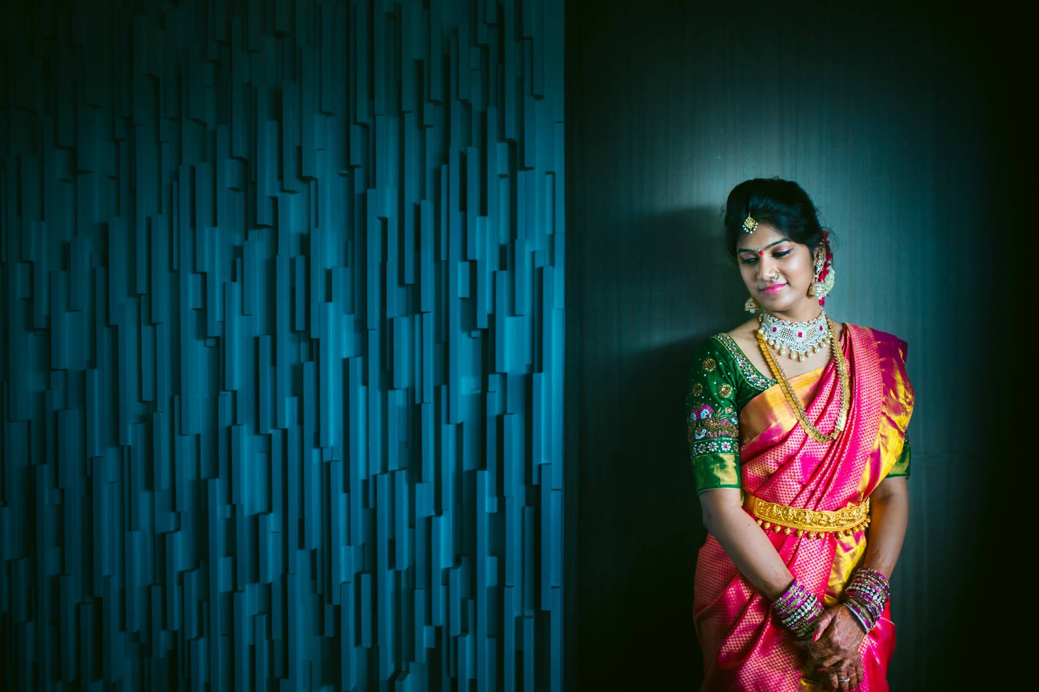 48. Contrast green blouse for red silk saree