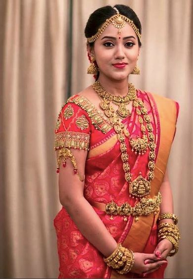 5. Thilagam design in Red Kancipuram Silk Saree