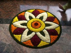 6.Simple flower pookolam