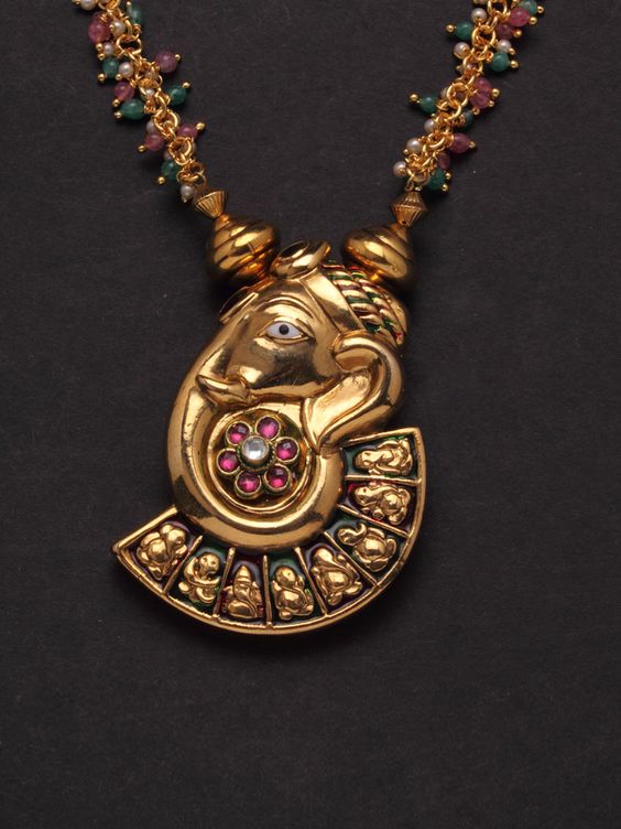 7.Ganesha Inspired Kundan stone Pendant