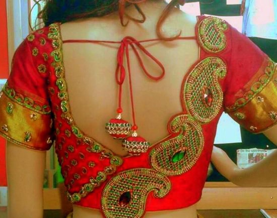 Blouse back neck design with stone work and paisleys