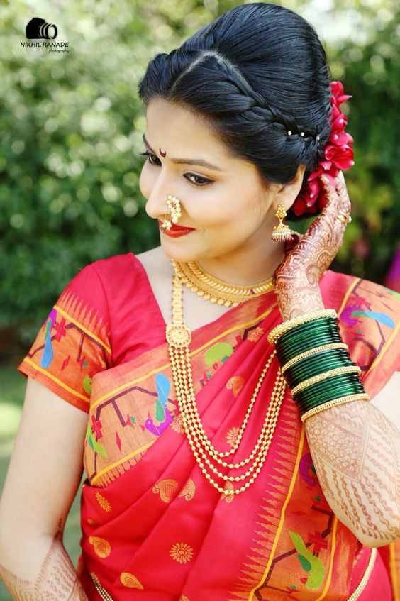 8. Red silk saree with colorful birds border