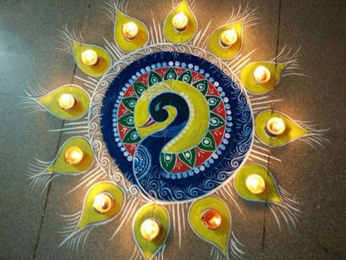 1.Round Peacock with Diya's