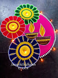 2.Two Diya's with flowers
