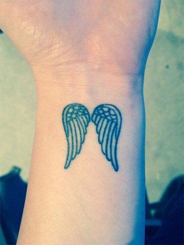 36.Angel Feather Tattoo