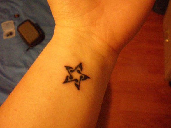 60.Star Tattoo