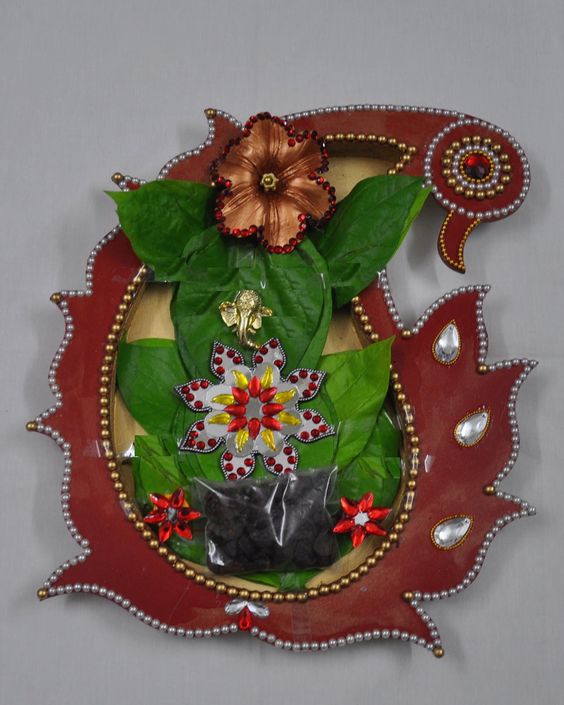 13.Ganesha with betel leaves 